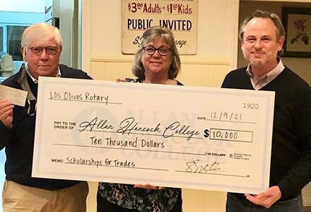 A check presentation from Los Olivos Rotary to AHC Foundation Executive Director Jon Hooten.